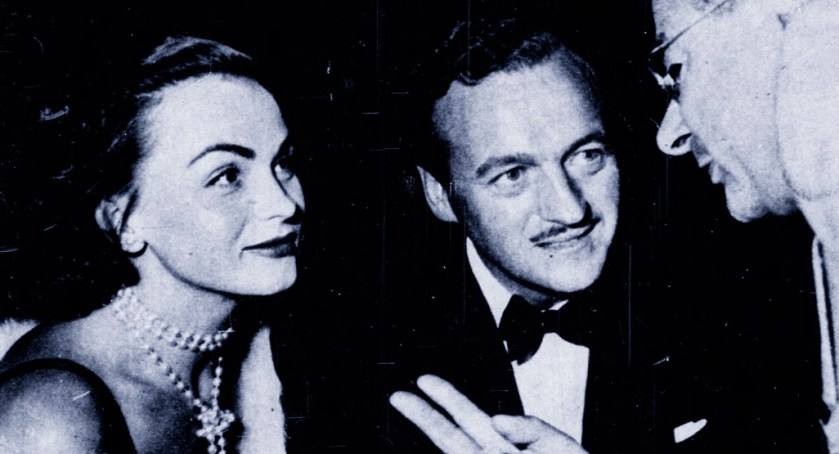 Hjordis and David Niven, talking to a Hollywood photographer, 1949