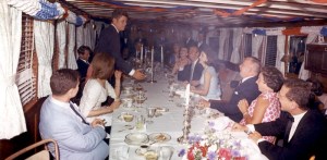 JFK's birthday party on The Sequoia. David Niven is sat opposite the president, beside The First Lady. 1963. No sign of Hjordis