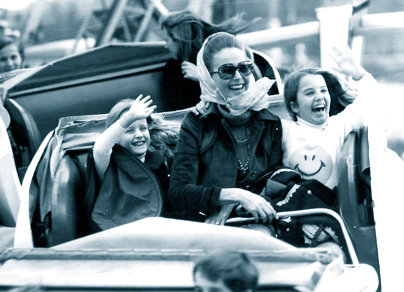 On a rollercoaster ride with Hjordis Niven. Kristina and Fiona, November 1971